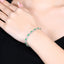 14K GOLD 2.36 CTW VIVID GREEN NATURAL EMERALD & DIAMOND BRACELET