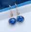 14K GOLD 11.03 CTW NATURAL TOPAZ & DIAMOND EARRINGS