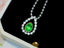 14K GOLD 0.69 CTW VIVID GREEN NATURAL EMERALD & DIAMOND PENDANT