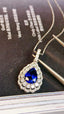 14K GOLD 1.45 CTW VIVID BLUE NATURAL SAPPHIRE & DIAMOND PENDANT