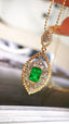 14K GOLD 0.78 CTW VIVID GREEN NATURAL EMERALD & DIAMOND PENDANT