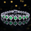 14K GOLD 3.55 CTW VIVID GREEN NATURAL EMERALD & SAPPHIRE BRACELET