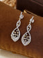 14K GOLD 1.00 CTW NATURAL COLOR DIAMOND & DIAMOND EARRINGS