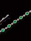 14K GOLD 5.26 CTW VIVID GREEN NATURAL EMERALD & DIAMOND BRACELET