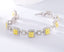 14K GOLD 6.31 CTW NATURAL YELLOW DIAMOND & DIAMOND BRACELET