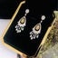 14K GOLD 4.35 CTW NATURAL YELLOW DIAMOND & DIAMOND EARRINGS