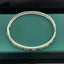 14K GOLD 4.03 CTW NATURAL EMERALD & DIAMOND BANGLE