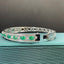 14K GOLD 4.03 CTW NATURAL EMERALD & DIAMOND BANGLE