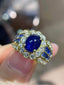 18K GOLD 4.67 CTW HEATED SAPPHIRE & DIAMOND RING