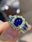 18K GOLD 4.67 CTW HEATED SAPPHIRE & DIAMOND RING