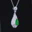 14K GOLD 1.47 CTW VIVID GREEN NATURAL EMERALD & DIAMOND PENDANT