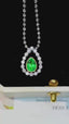 14K GOLD 0.69 CTW VIVID GREEN NATURAL EMERALD & DIAMOND PENDANT