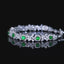 14K GOLD 2.76 CTW VIVID GREEN NATURAL EMERALD & DIAMOND BRACELET